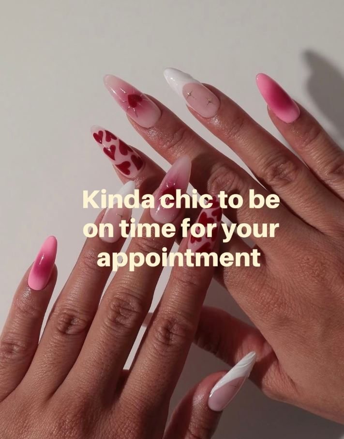 Pink and white nail set with hand-painted heart detail