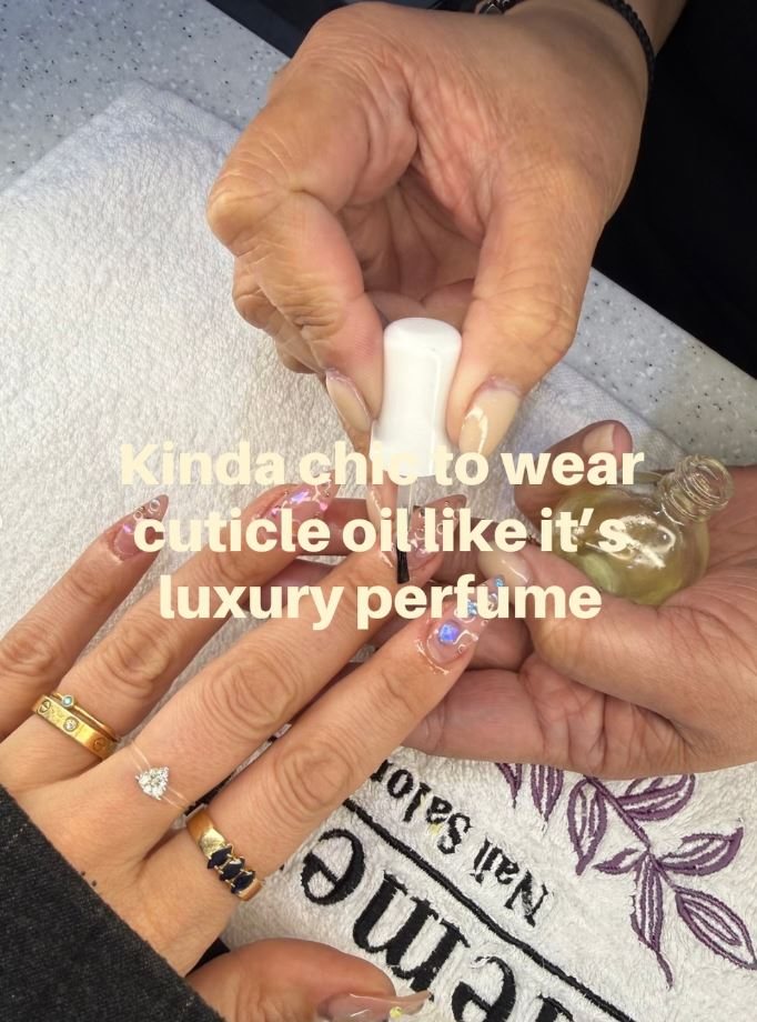 Cuticle oil applied to a finished manicure