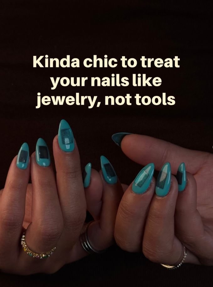 Teal chrome almond nails with gold jewellery